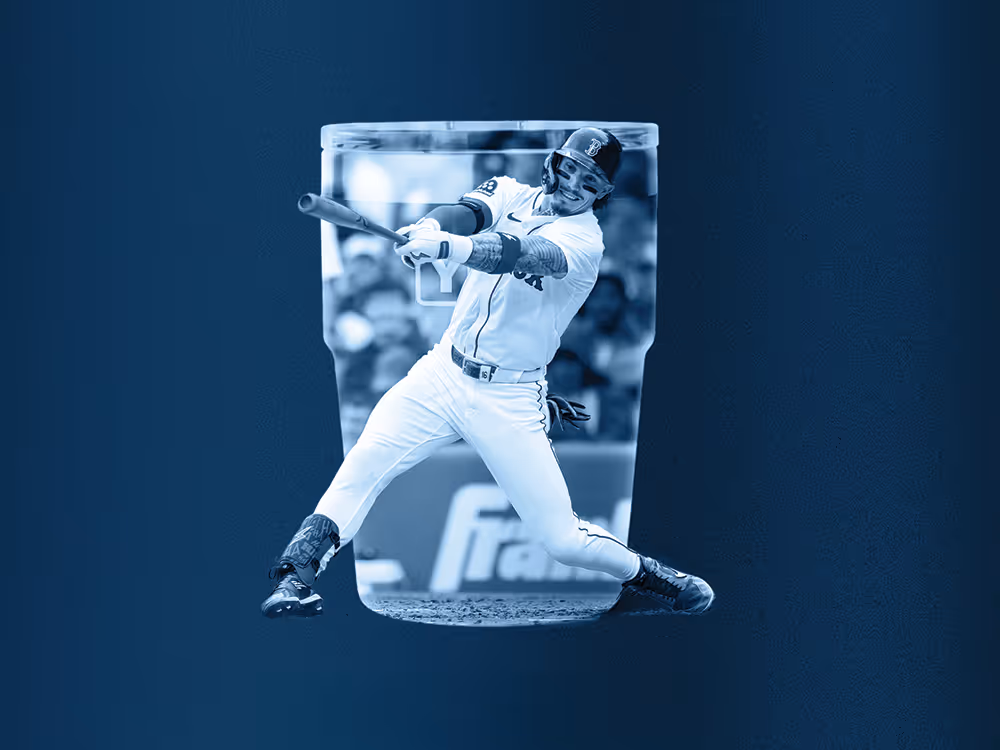 Baseball player in mid-swing wearing a Boston Red Sox uniform with face paint overlayed over a YETI cup.