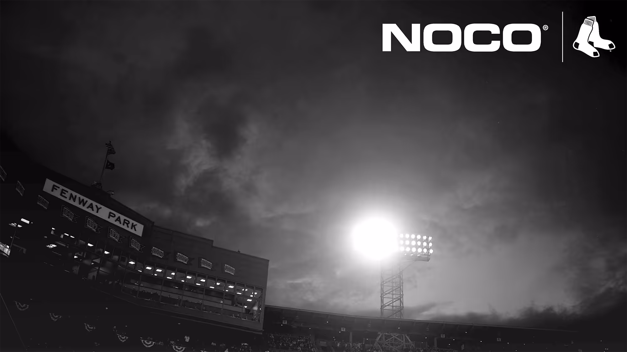 Slide deck cover featuring nighttime view of Fenway Park stadium with illuminated floodlights and partly cloudy sky.