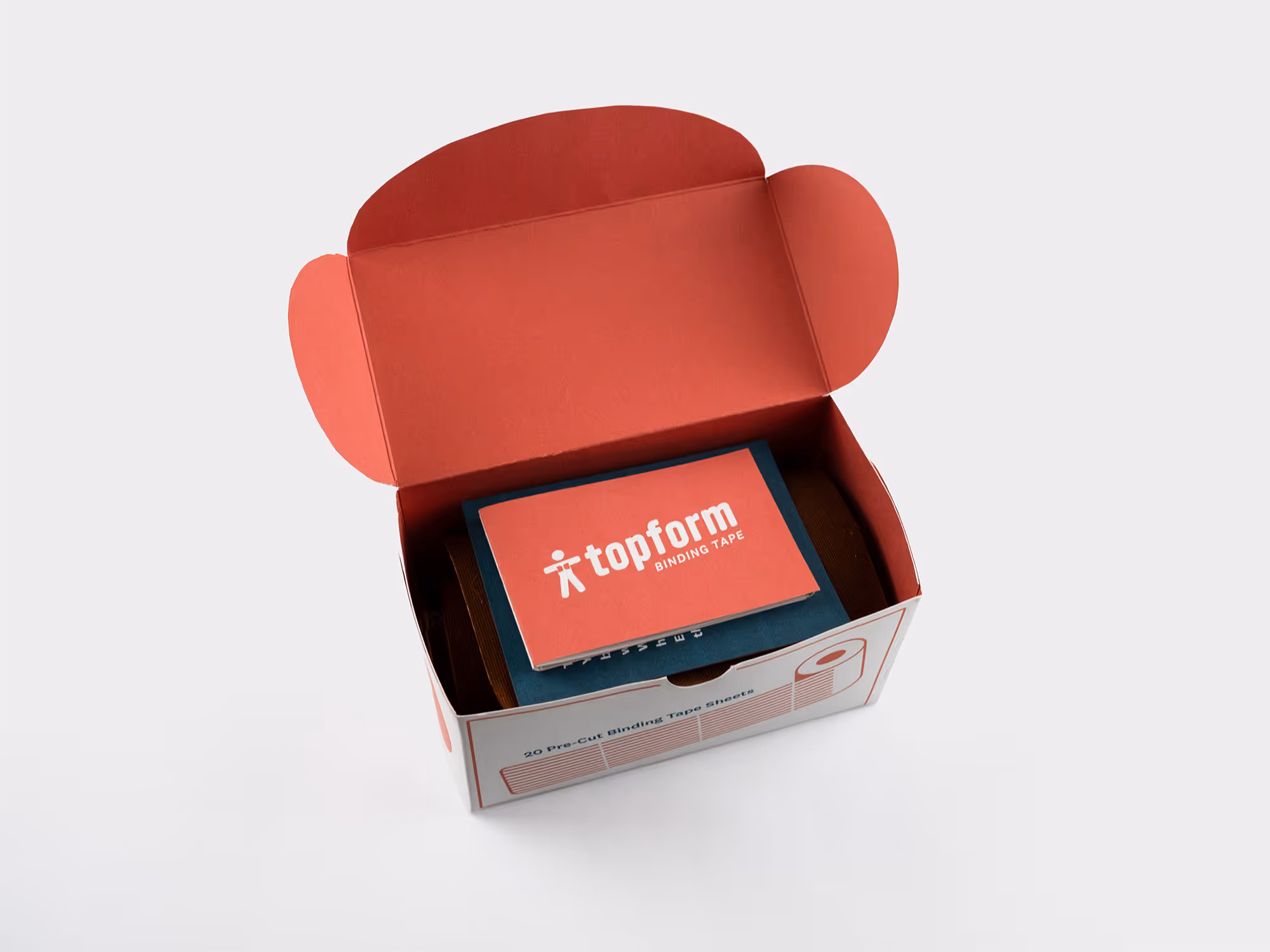 Open red and white box with Topform binding tape and instruction cards inside.