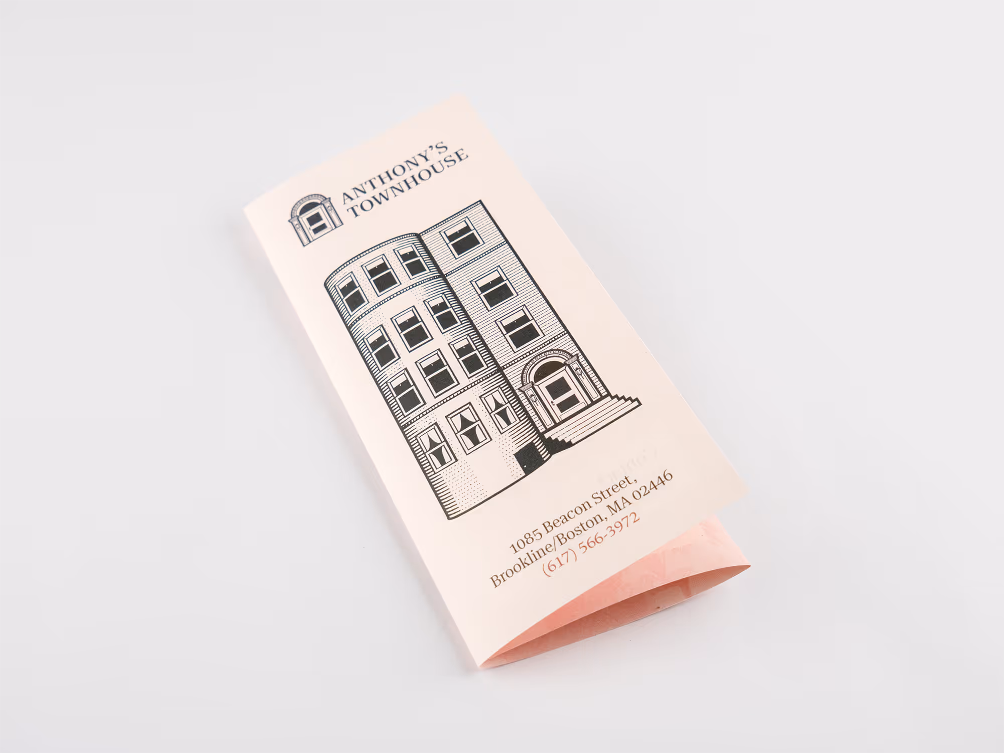 Folded brochure for Anthony’s Townhouse featuring an illustration of a townhouse and its address in Brookline/Boston, MA.