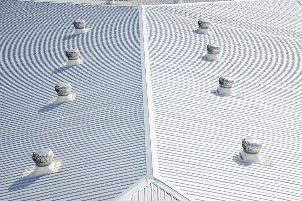 House with metal aluminum roof