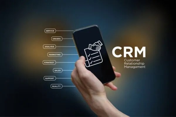 Phone screen with a CRM and the eight aspects of a good CRM