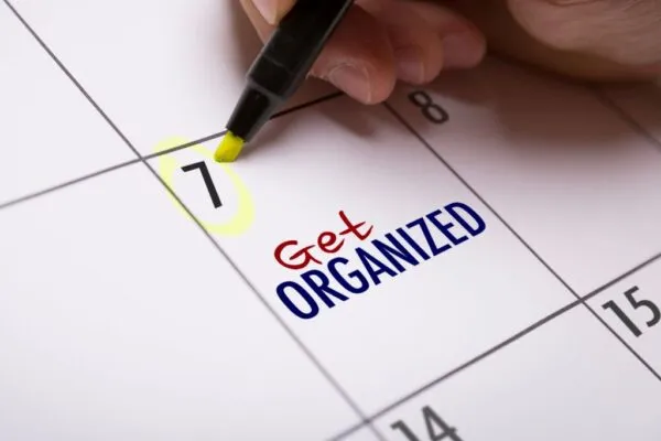 A calendar with a date circled and note to get organized