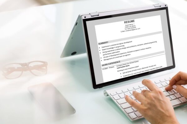 Working on a roofing resume on a tablet