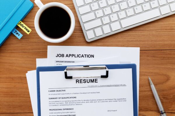 A roofer resume on a clipboard