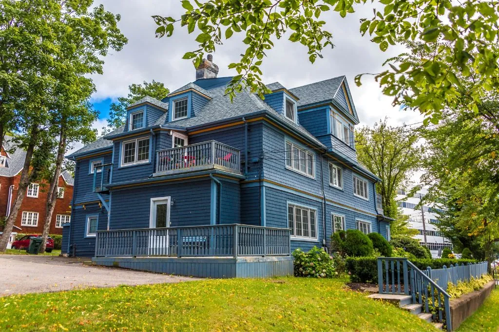 A house with new blue siding after a siding project
