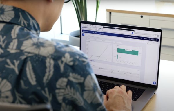 Using JobNimbus roofing software on a laptop