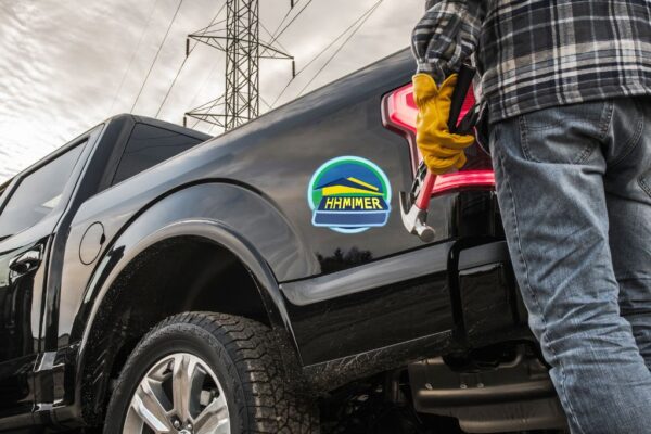 Roofing truck wrap logo man with a hammer