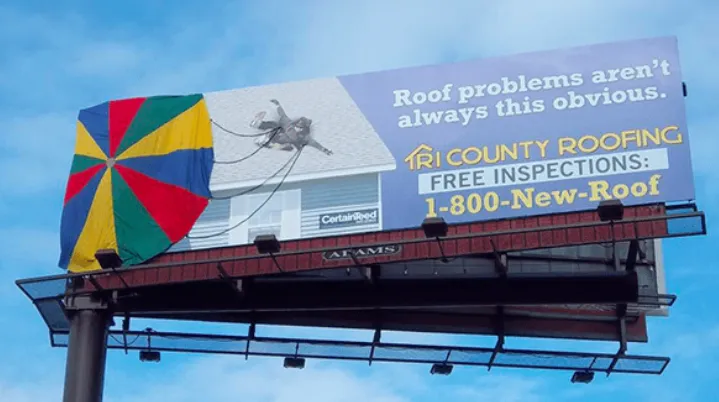A roofing billboard with a parachute