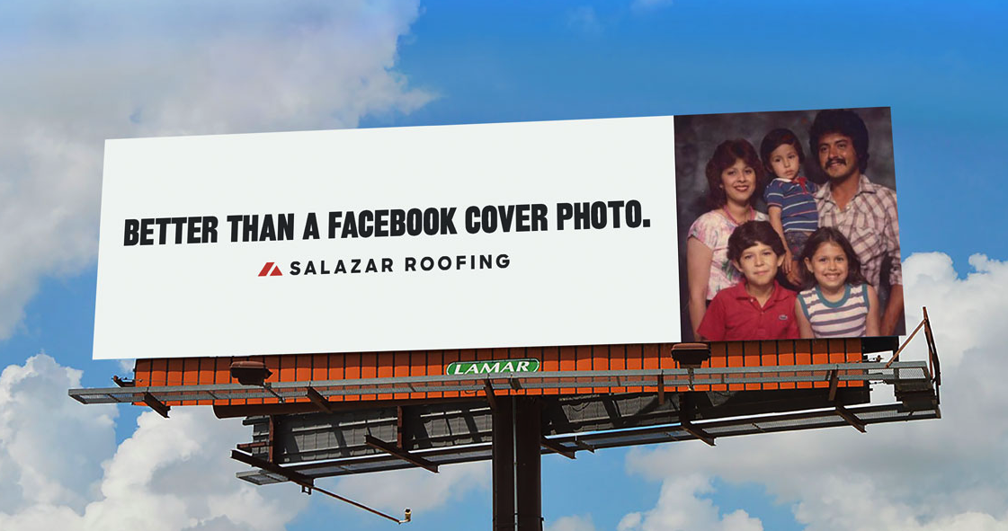 A roofing billboard showcasing a family photo