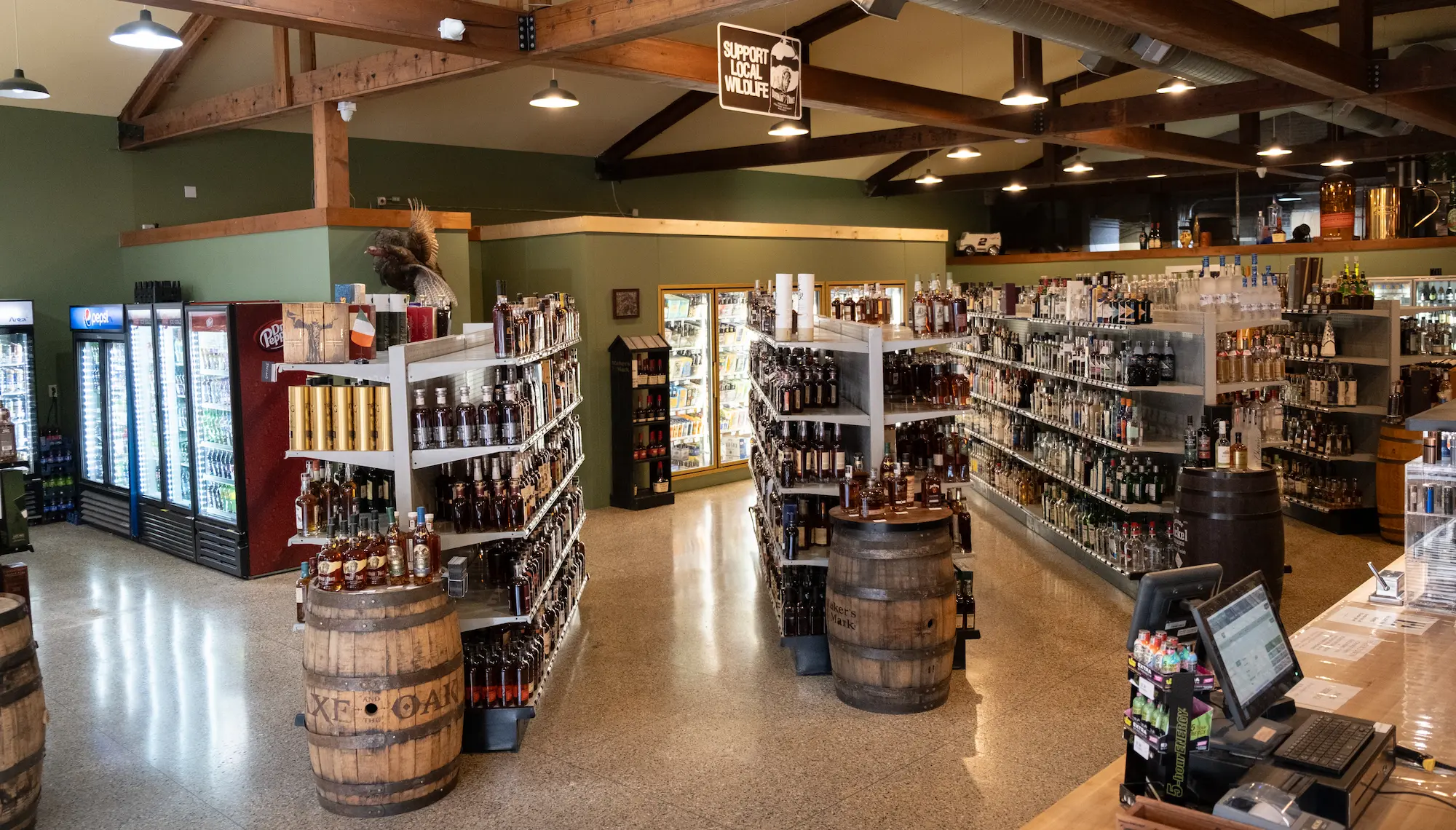 The rows of shelves filled with fine wines and spirits in Dante's Purgatorio
