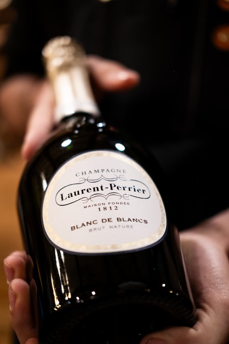 A bottle of Laurent-Perrier champagne