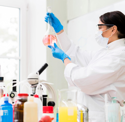Scientist in a laboratory conducting chemical research, representing safe and tested pest control solutions

