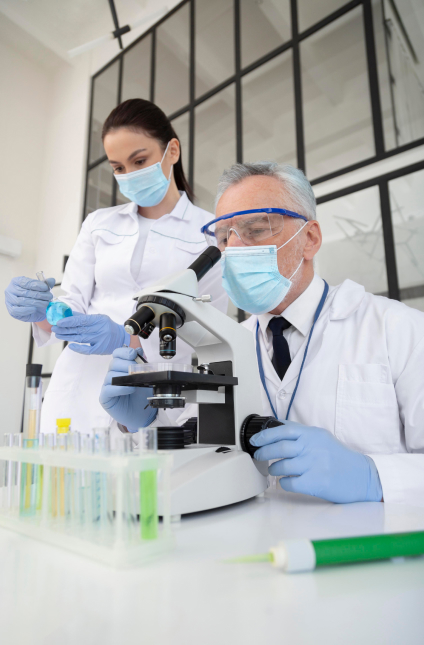 Two scientists in a laboratory analyzing samples through a microscope, researching pest control formulas