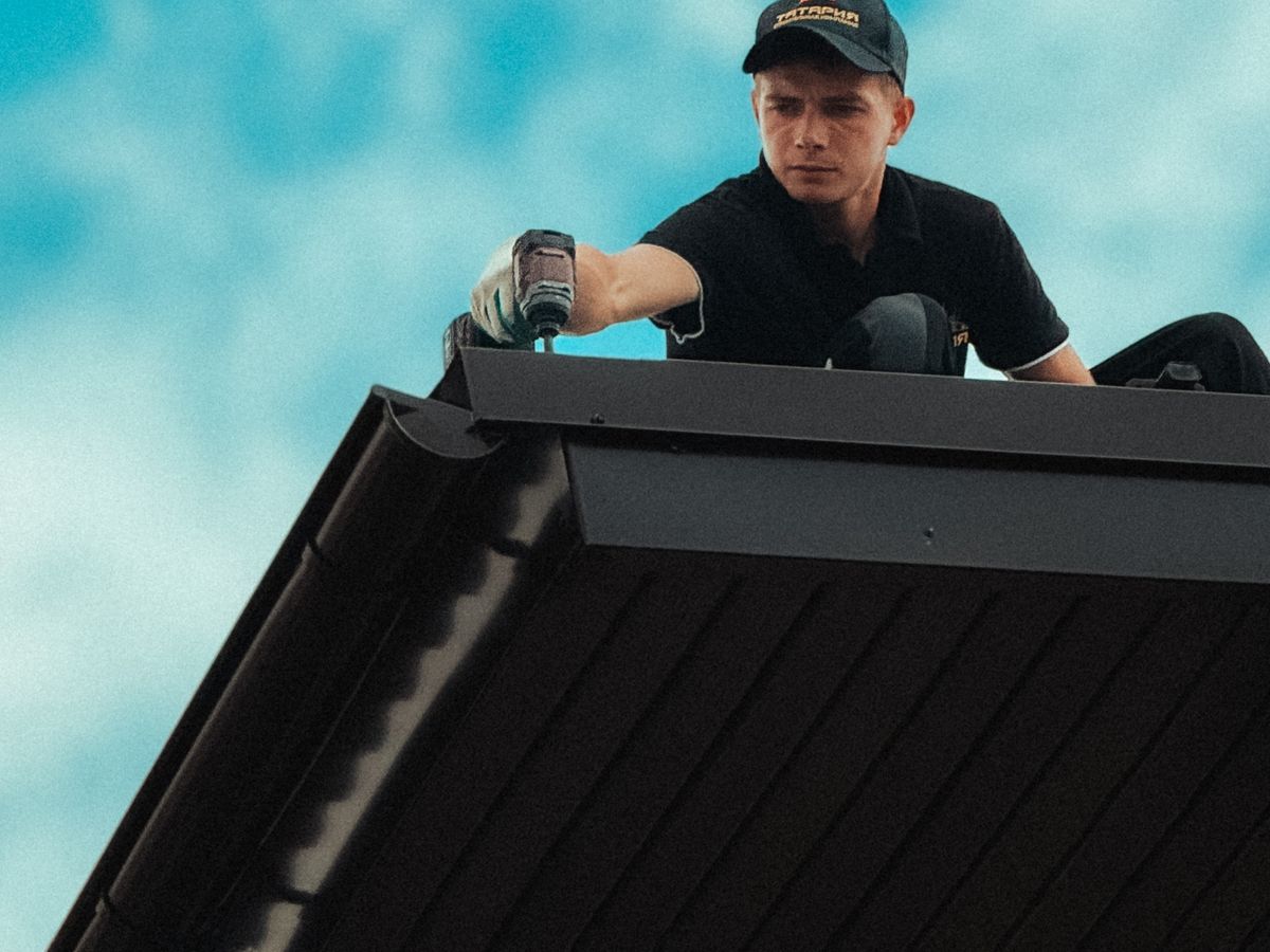 Gutters along the roofline of a house