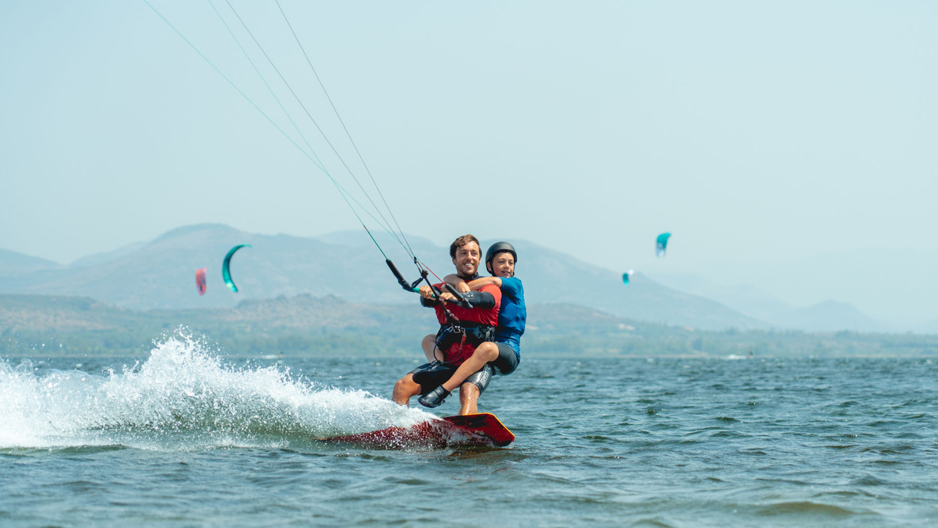kitesurf courses for kis Italy Sardegna kite village punta trettu sardinia