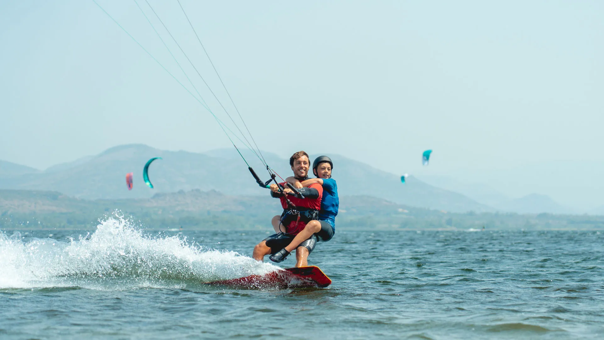 kitesurf courses for kis Italy Sardegna kite village punta trettu sardinia