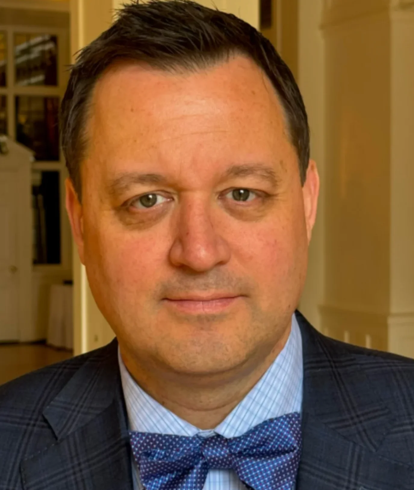 Headshot of Nick Schwarzrock, the Chief Revolutionist.