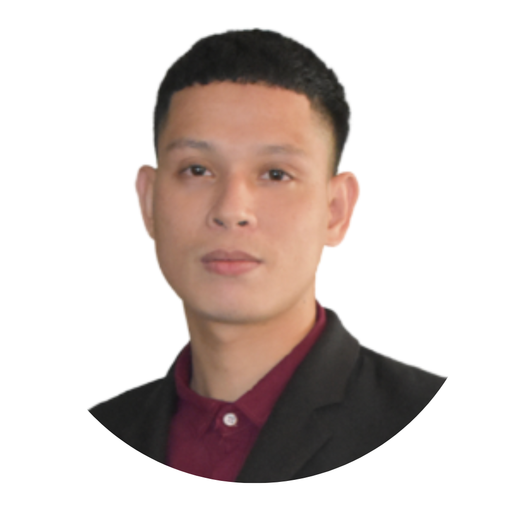 Portrait of a man with short black hair wearing a dark blazer and maroon shirt.