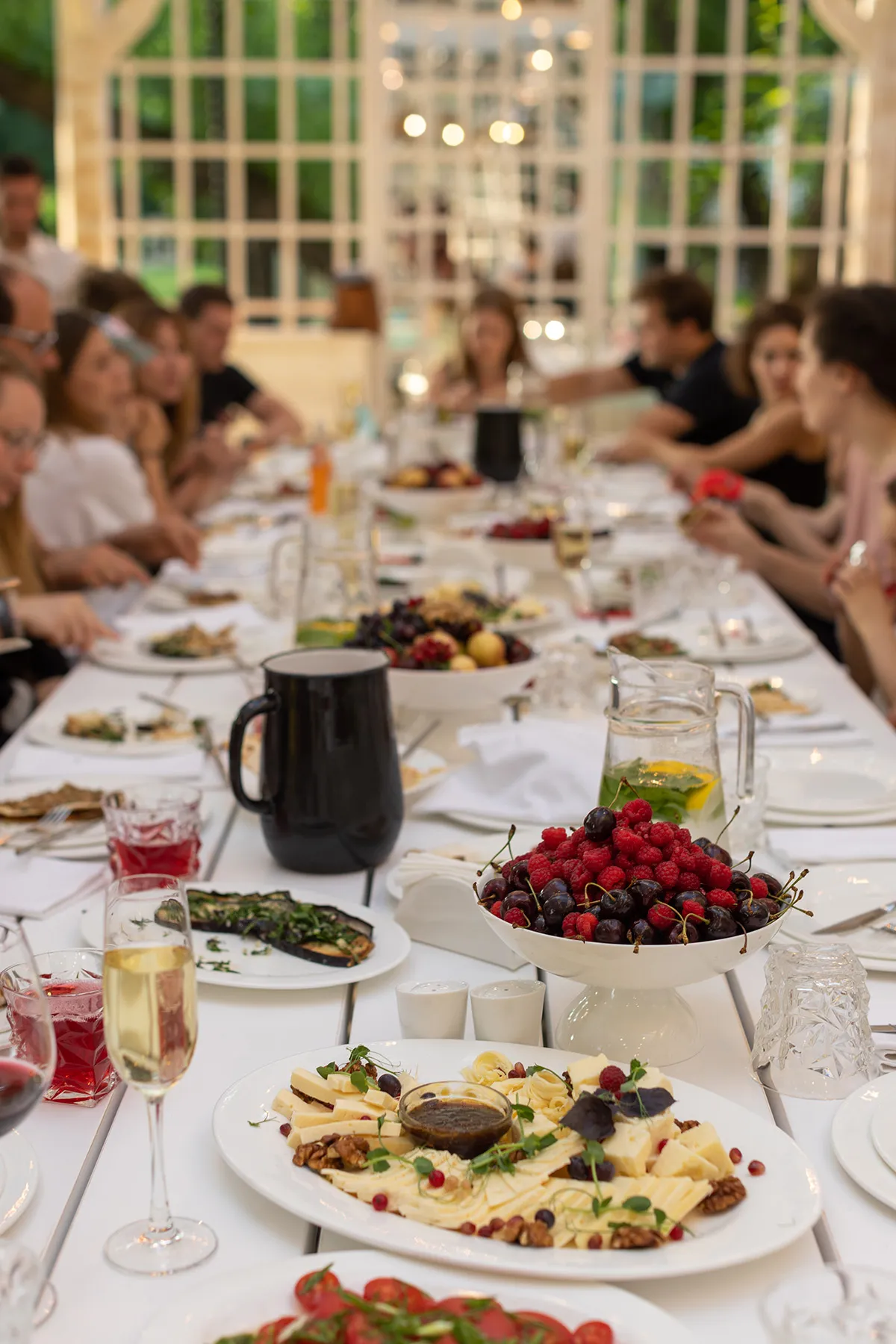 A group of people enjoying fine dining experience in the comfort of their own home.