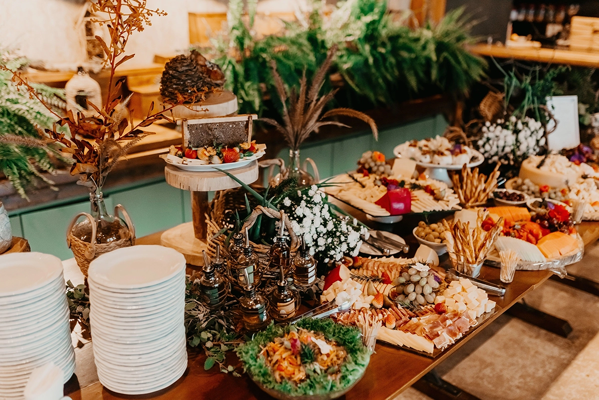 Close-up of a beautifully arranged holiday dessert table with assorted sweets and snacks, showcasing a complete and thoughtfully planned event setup in Scottsdale.