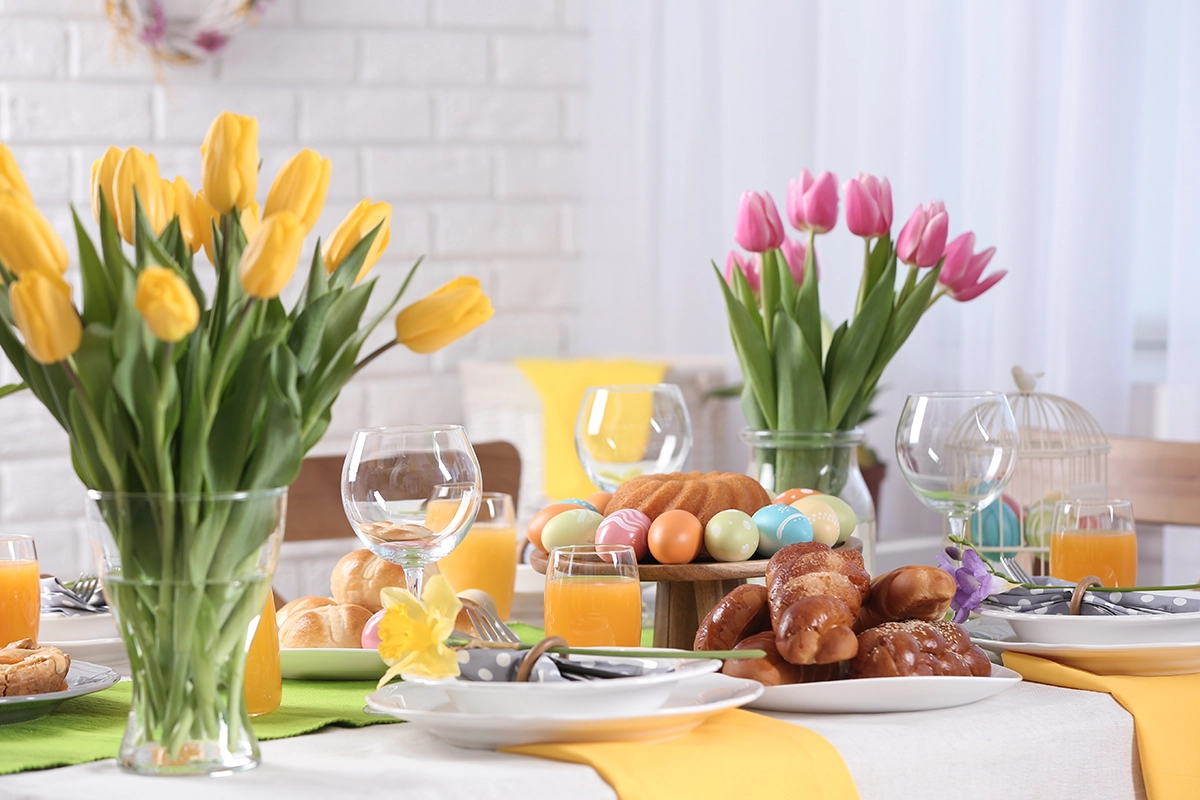 Spring event table design with fresh flowers and luxury place settings