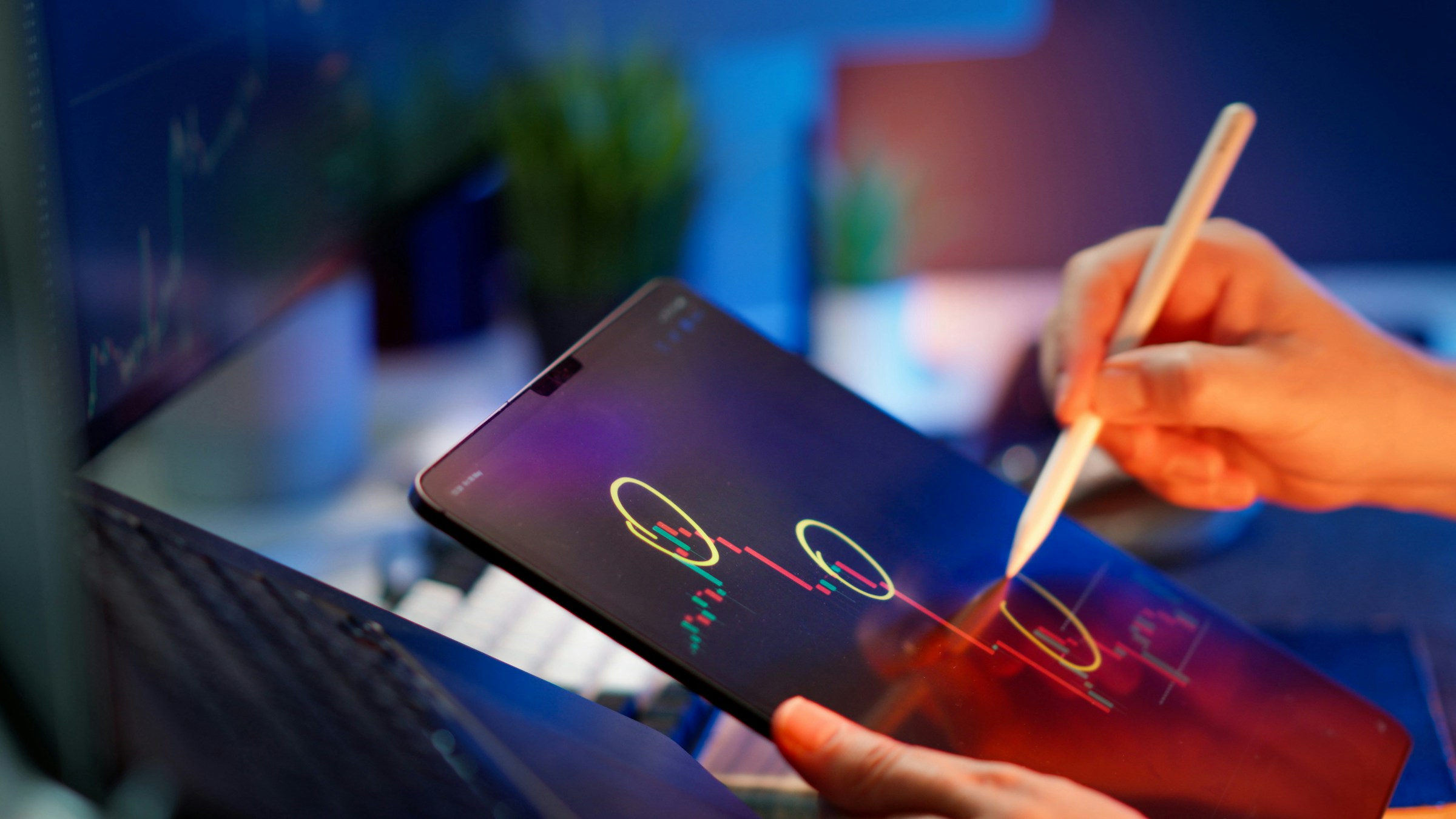 trading on a tablet - Prop Trading vs Hedge Fund