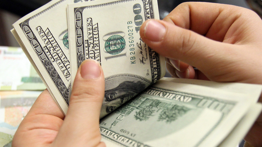 woman counting money - How Much Can You Make Day Trading With $1,000		