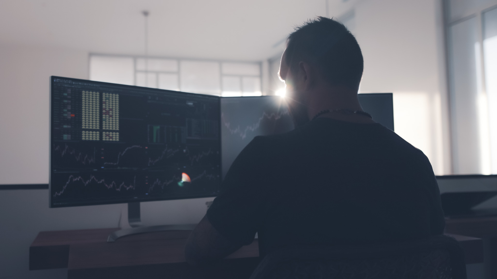 man trading in a room - What is Liquidity in Day Trading