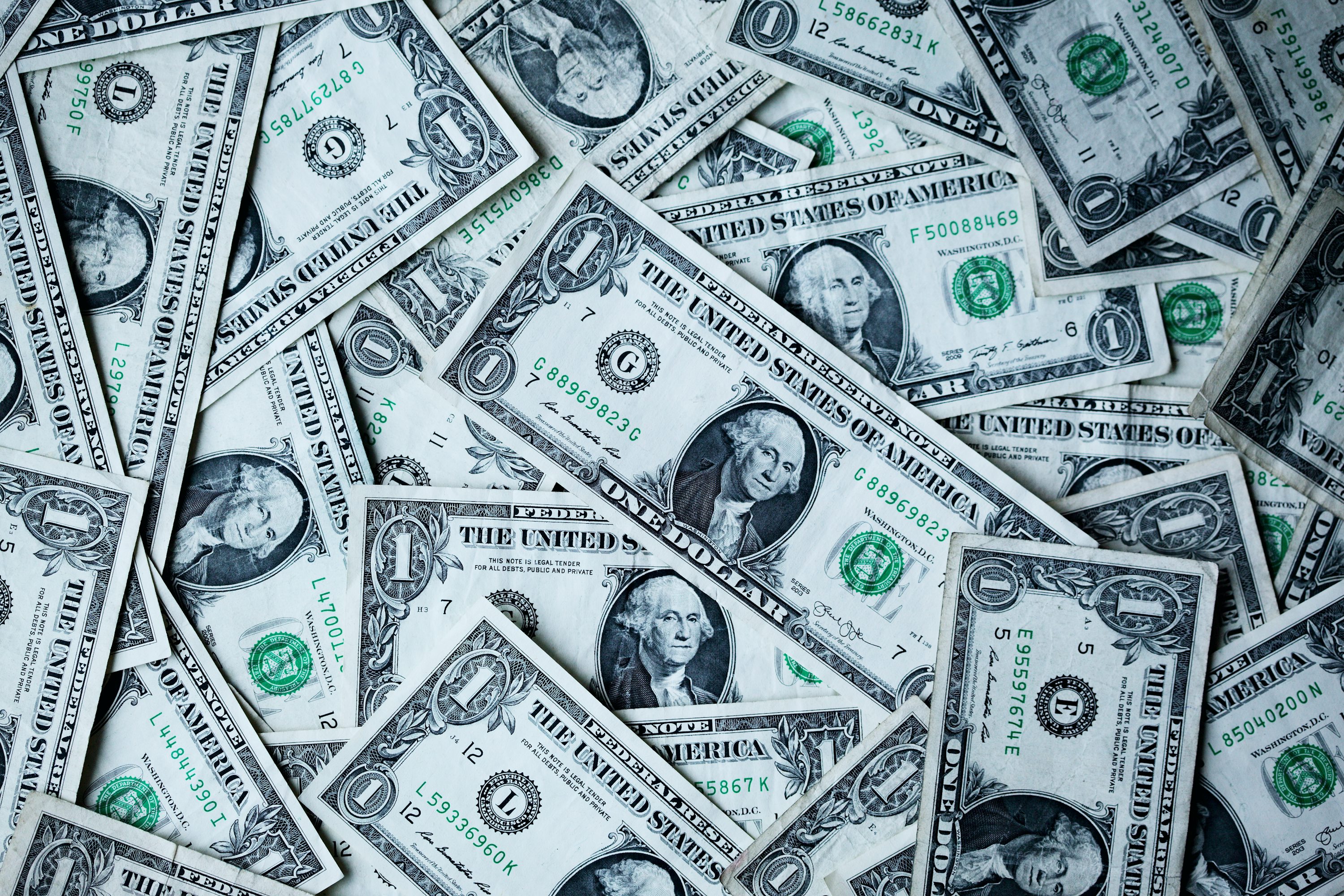 dollar bills - Best Day Trading Stocks