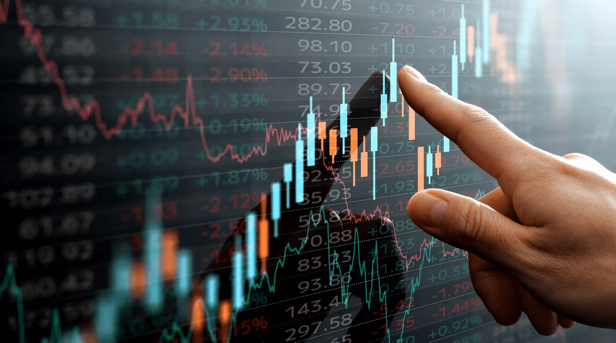 Person touching digital screen - How to Learn Stock Trading for Beginners