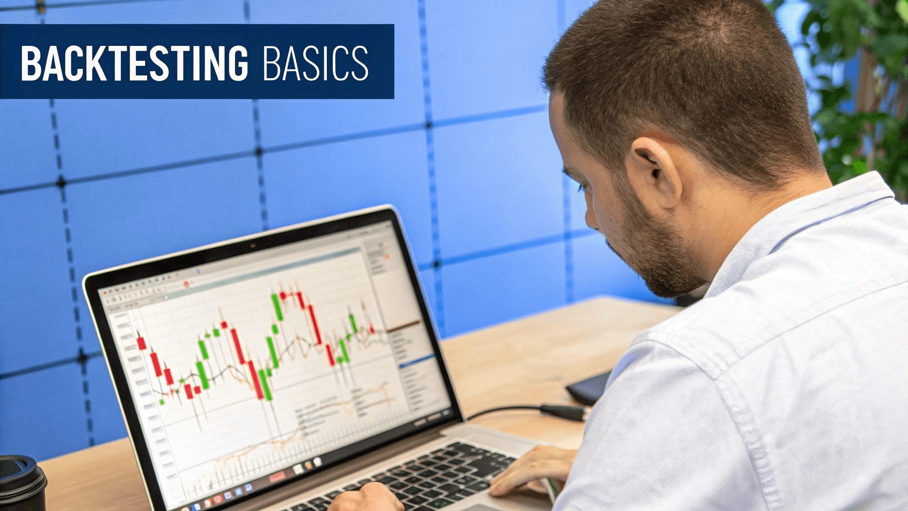 A man studying financial stock charts - Best Practices for Backtesting Trading Strategies