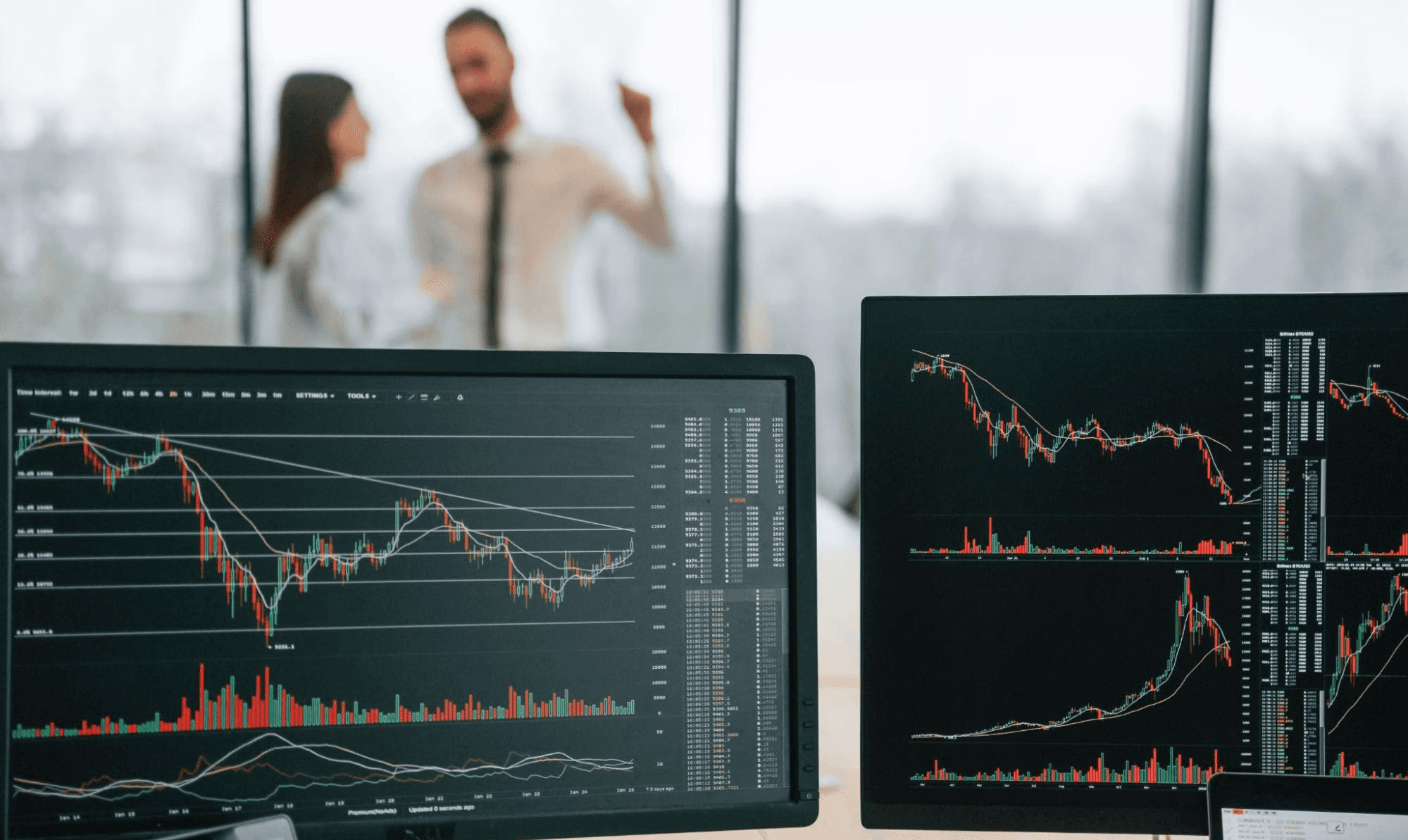  Stock market charts on computer screens - Backtesting Trading Strategies