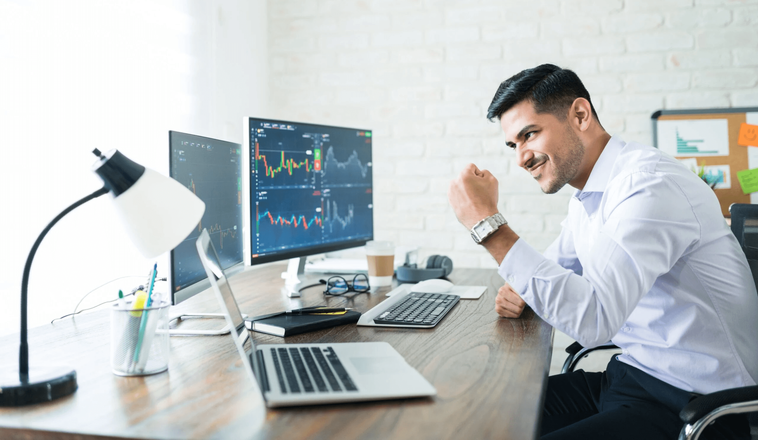 Trader celebrating successful market gains - What Is Take Profit in Trading