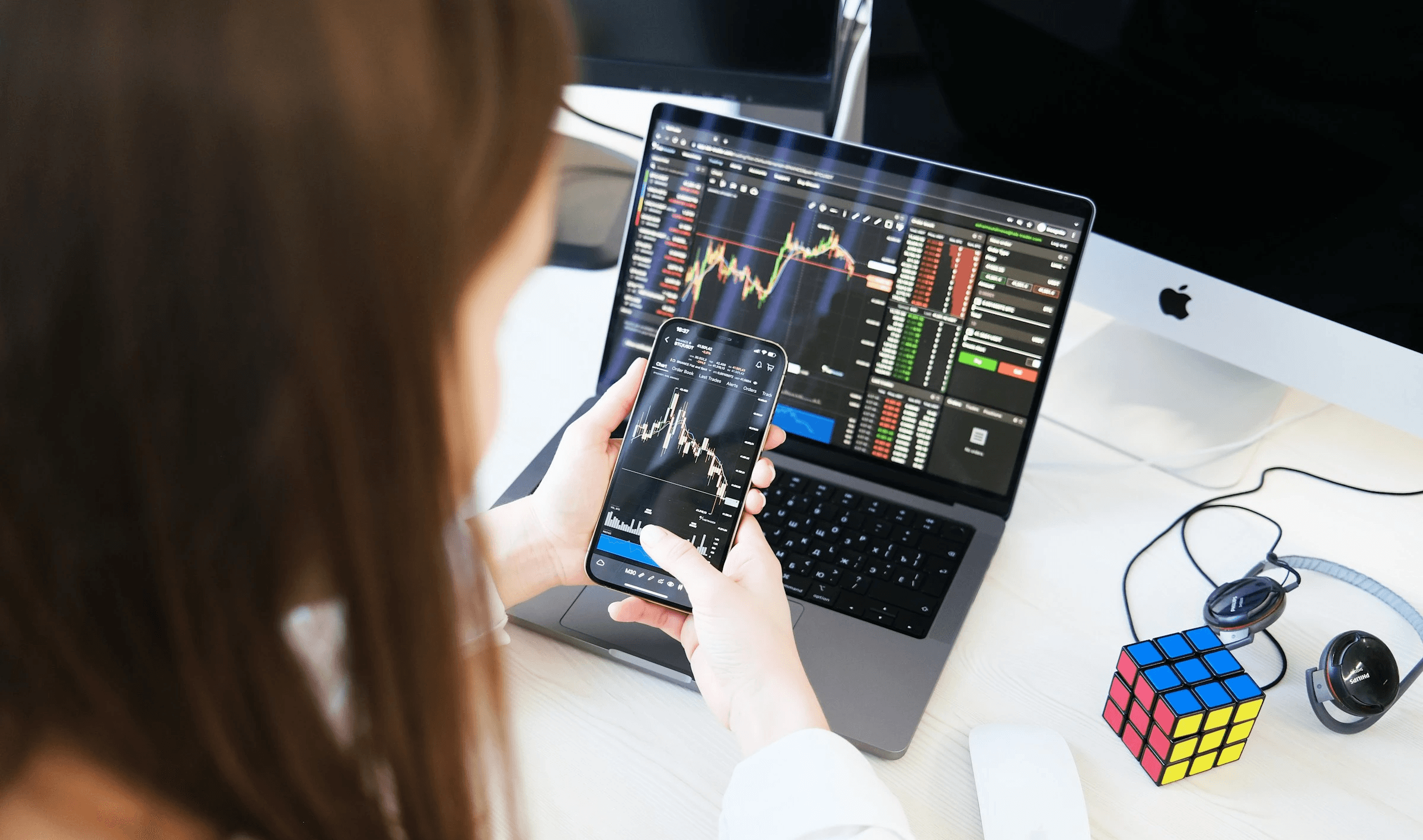 Woman analyzing stock market trading charts - Best Chart Trading Platform