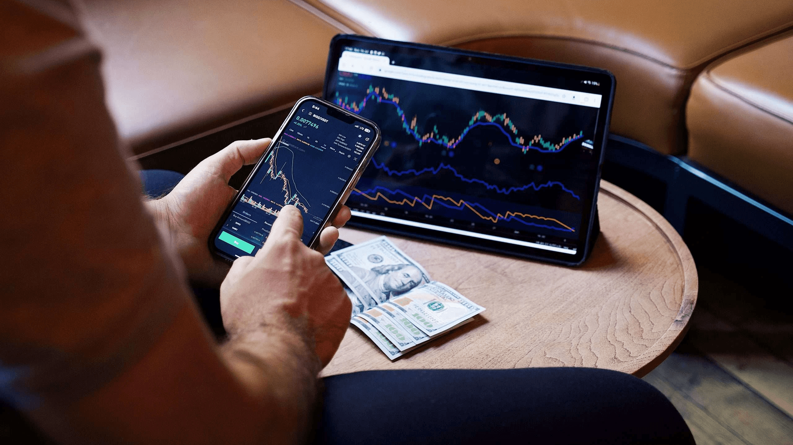  Man analyzing financial market growth charts - How To Practice Day Trading