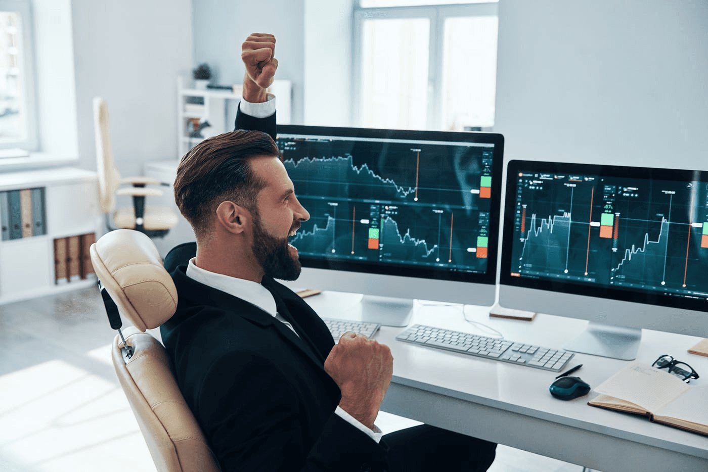 Trader celebrating profitable market trends - Prop Firms That Use MT5