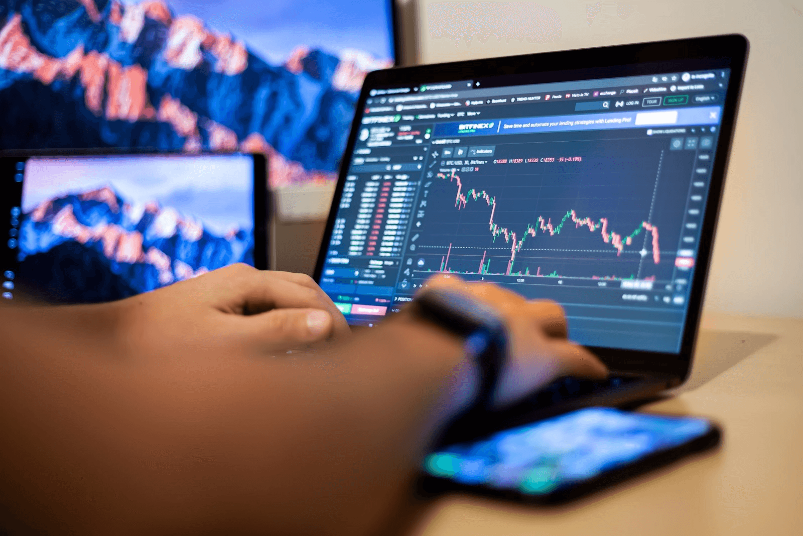 Person trading stocks on a laptop -  Best Prop Firms in Nigeria
