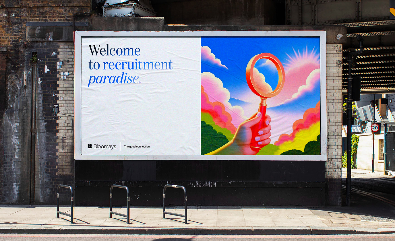 Affiche publicitaire extérieure avec visuel coloré et texte Welcome to storytelling paradise.
