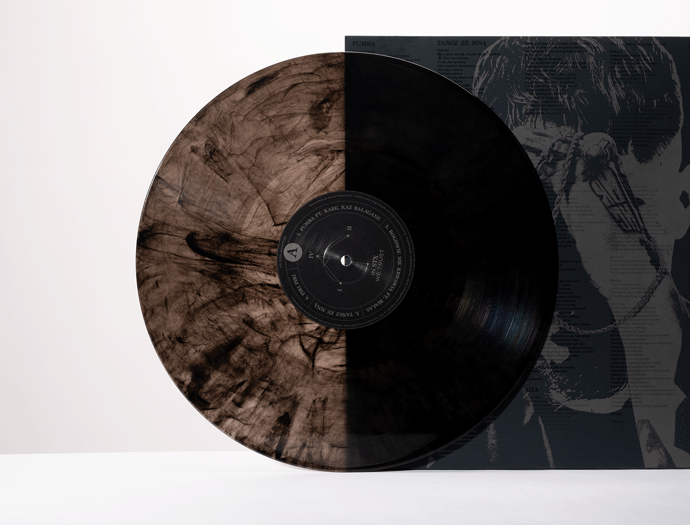 black vinyl sleeve with grey illustration and brown vinyl on top of it