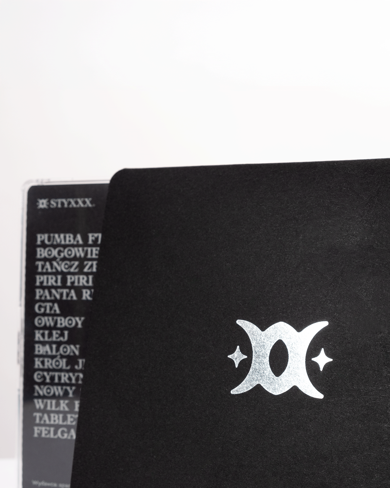 product photo of a cd cover with silver logo