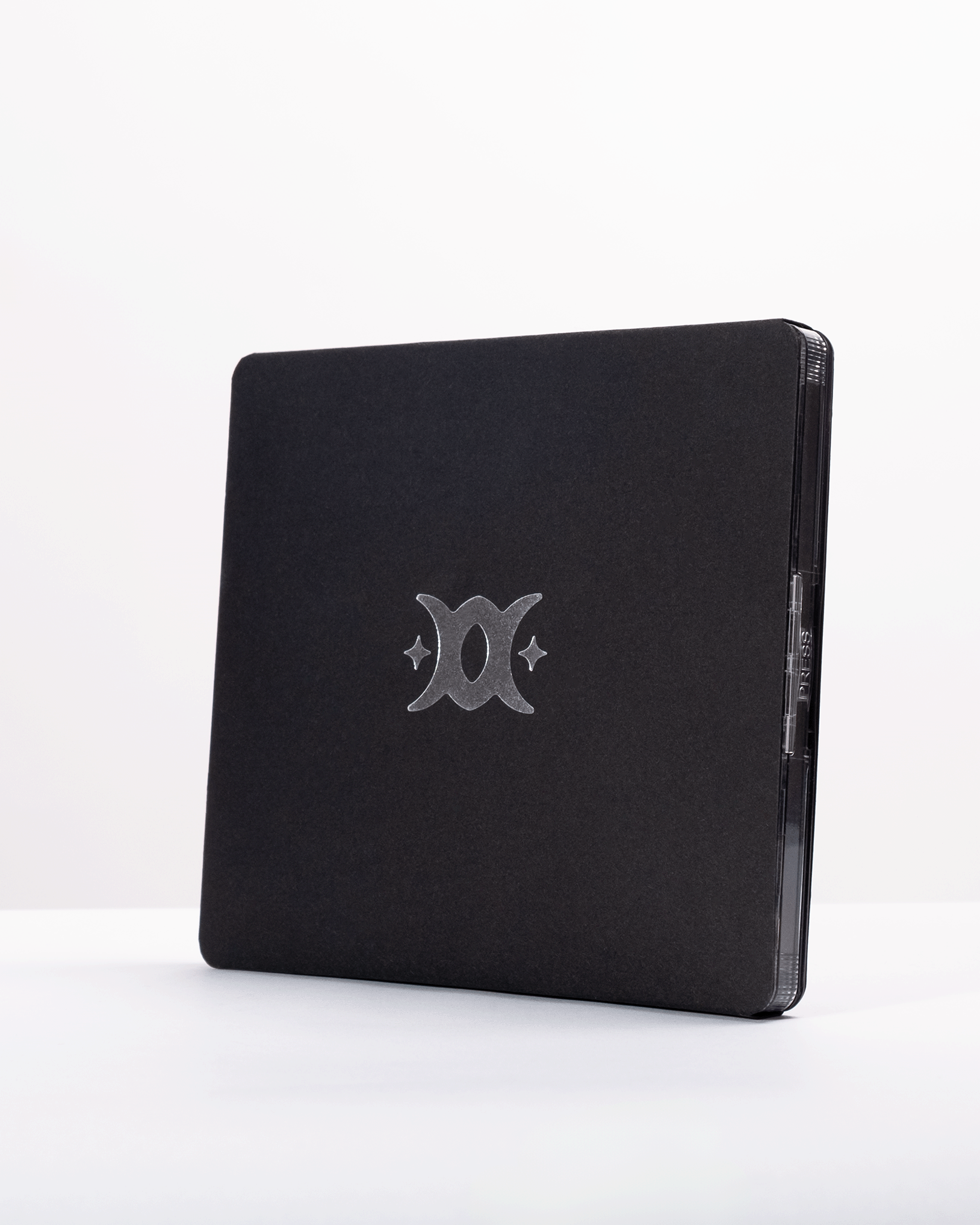 product photo of a cd cover with silver logo