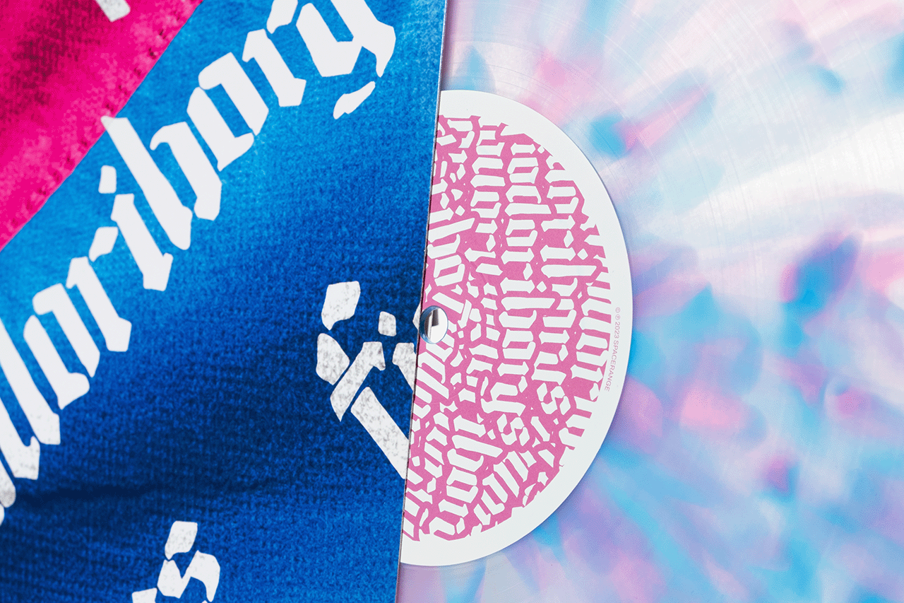 product detail photo of an vinyl with two colored flag on a cover 