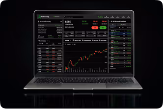 purpose of investing - image of stock trading on laptop