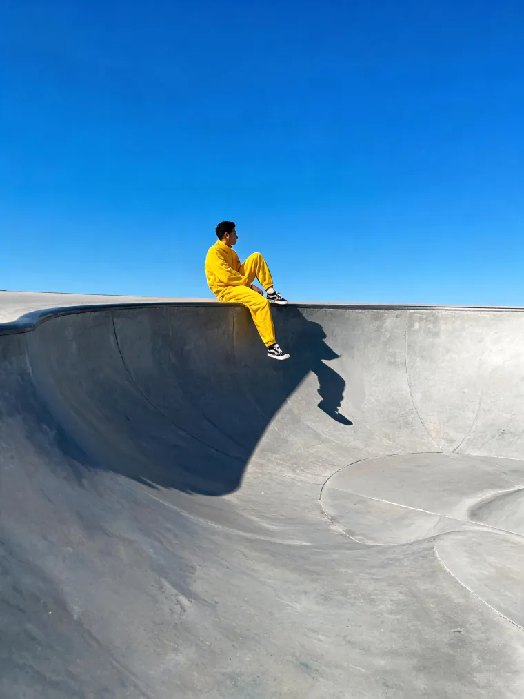 Yellow tracksuit in the skate park