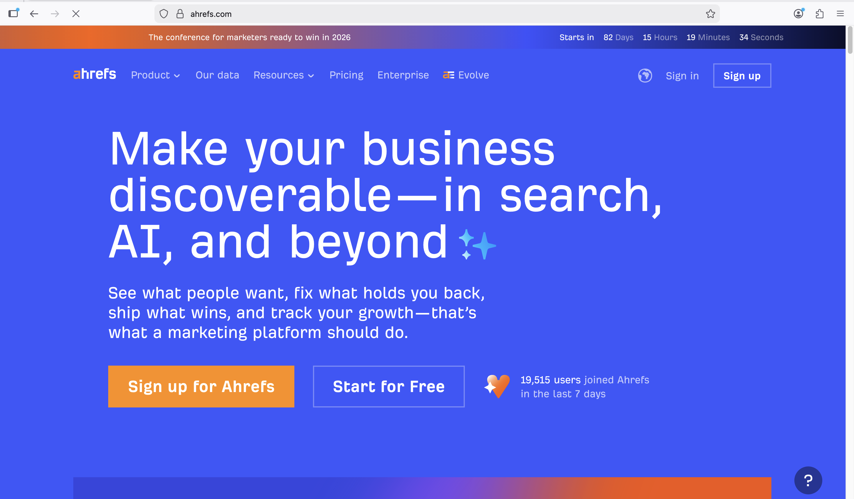 Screenshot of the Ahrefs homepage with the headline “Make your business discoverable—in search, AI, and beyond,” navigation links, and call-to-action buttons for “Sign up for Ahrefs” and “Start for Free.”