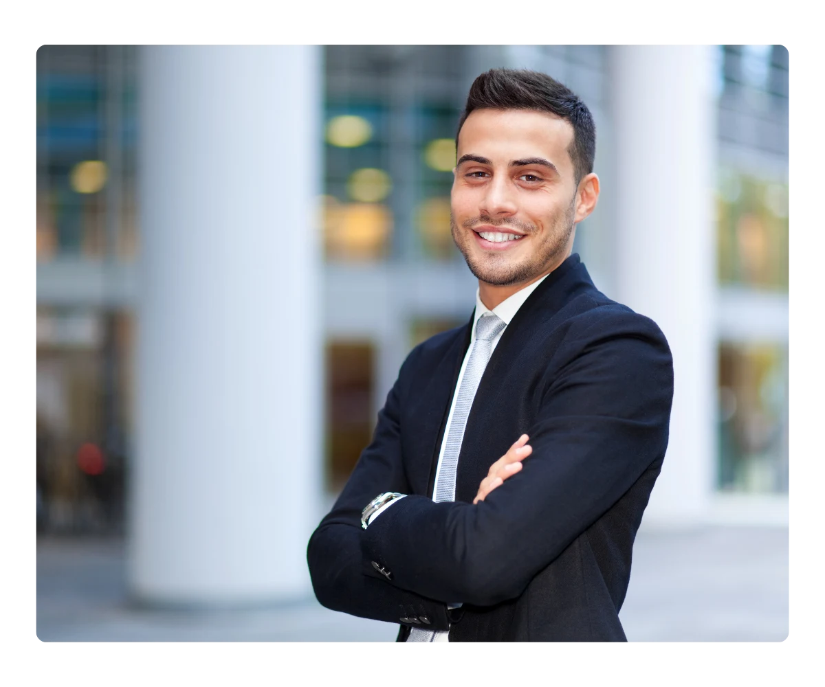 Entrepreneur outside an office—business influencer partner for the Kommunicate Affiliate Program.