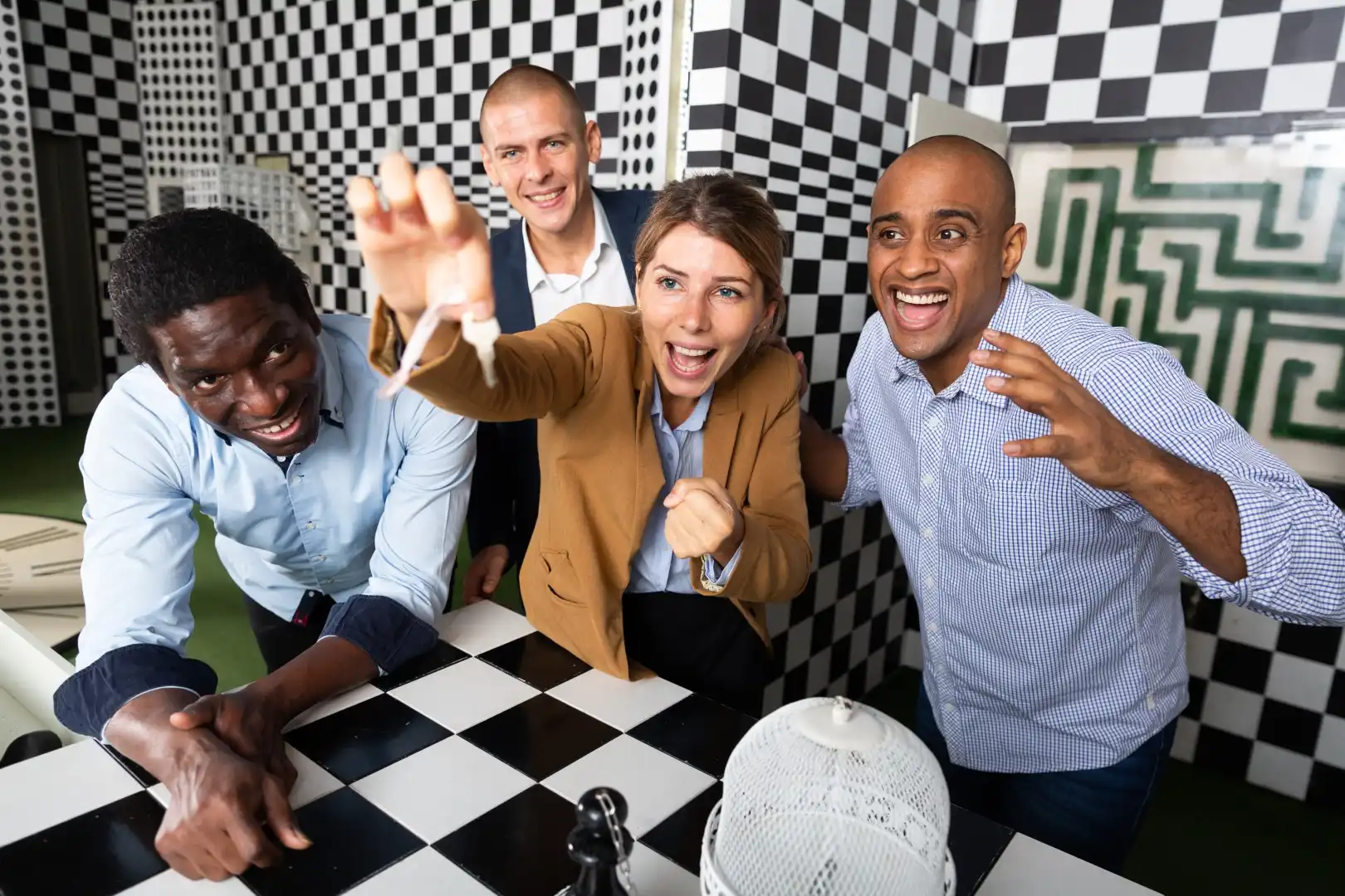 Colleagues collaborating inside an escape room as part of a corporate away day in Edinburgh