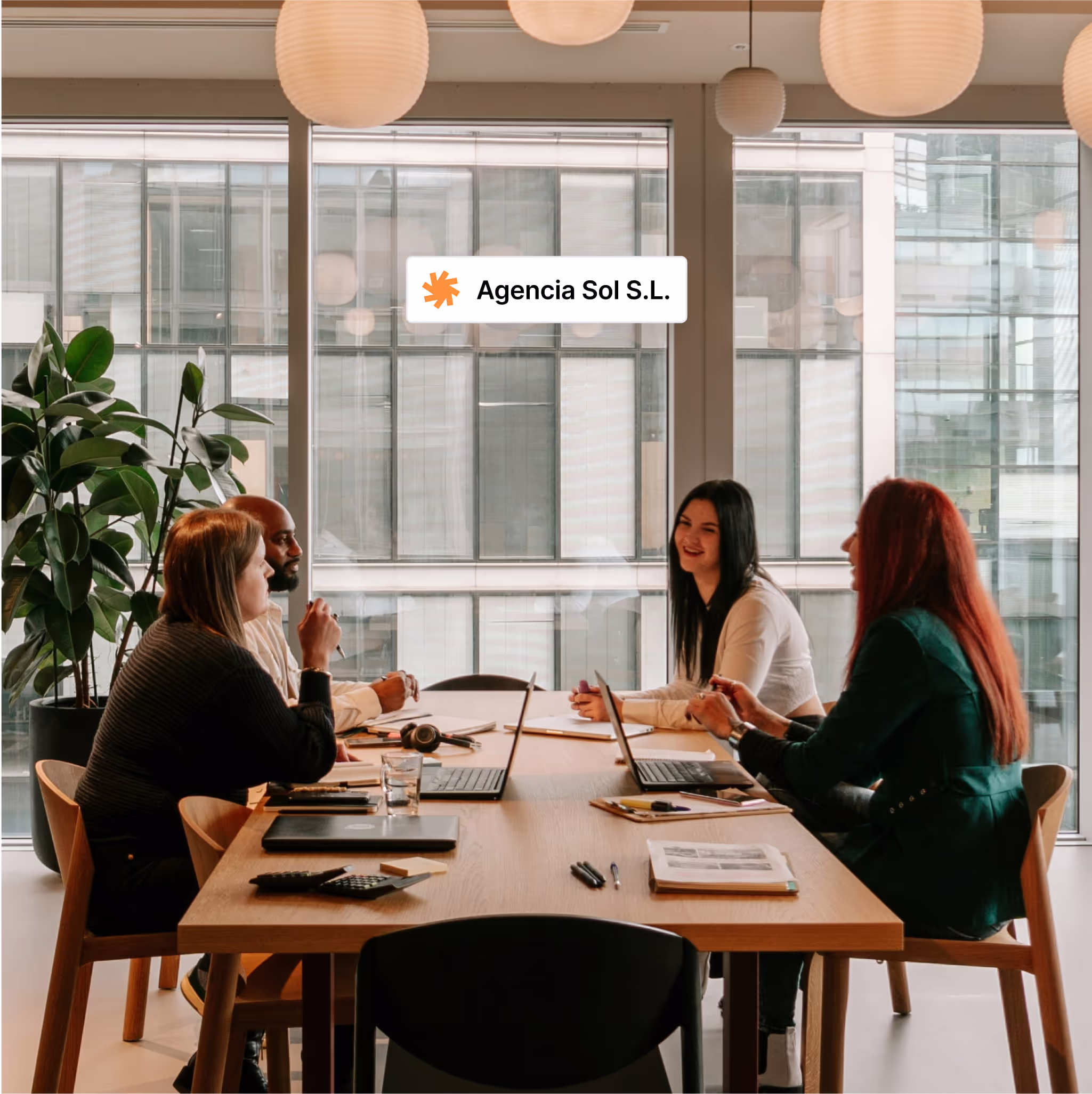 Members of an agency sitting around a table