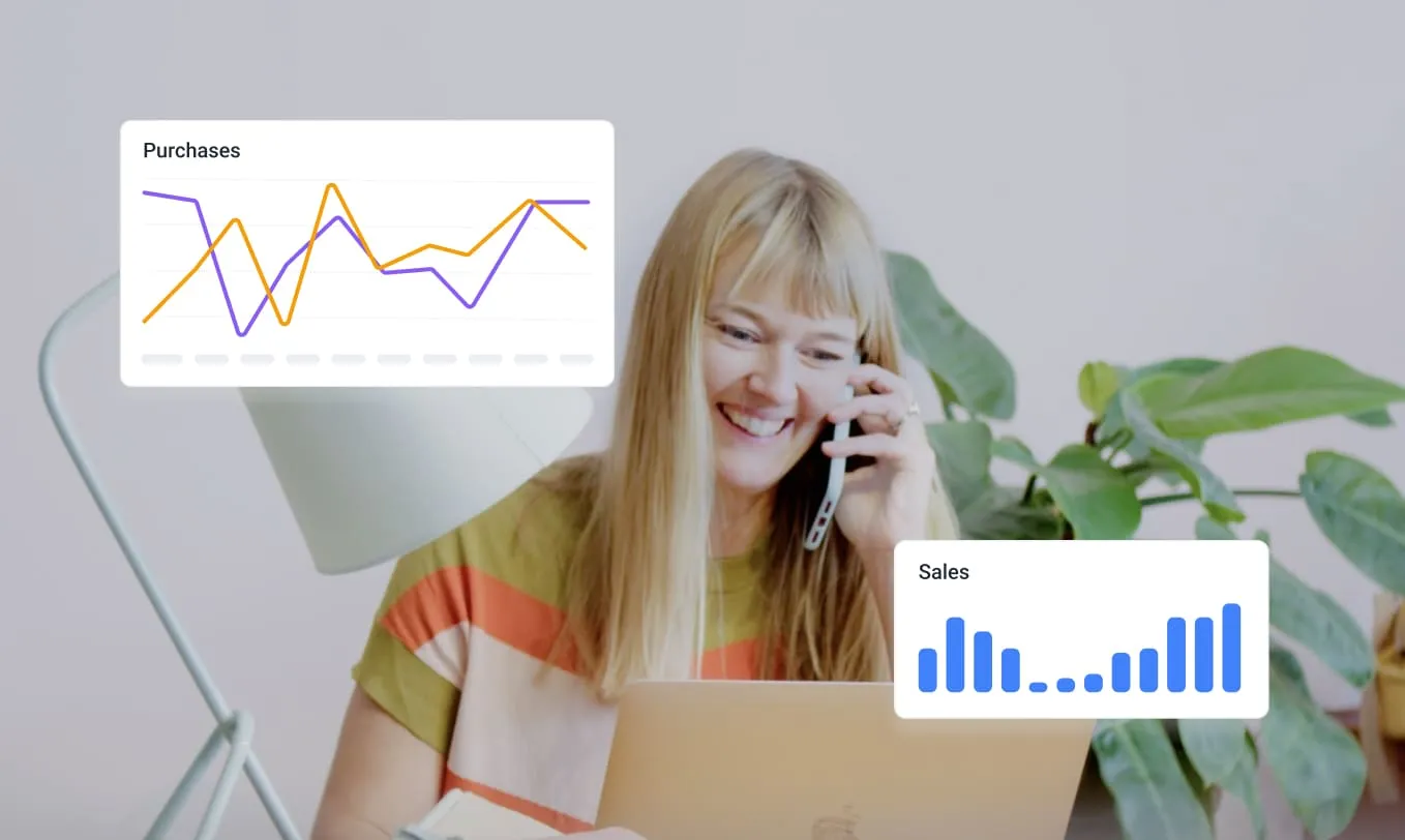 Holded user with graphics floating around her